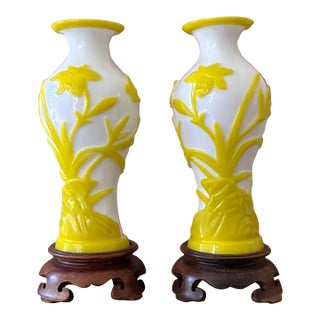 Pair of Mid-Century Peking Glass Vases With Carved Yellow Floral and Butterfly Motif | Chinese Overlay Glass on Wood Stands For Sale