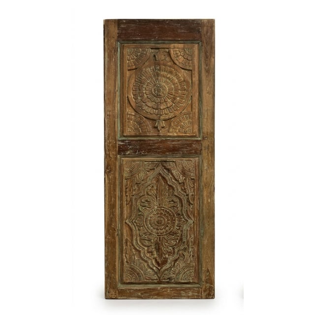 Make a striking statement with this vintage Indian sliding barn door, hand-carved with an intricate lotus mandala motif...