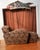 Vintage upholstered chaise lounge featuring a streamlined late 20th century silhouette with rolled rectangular arms and an...