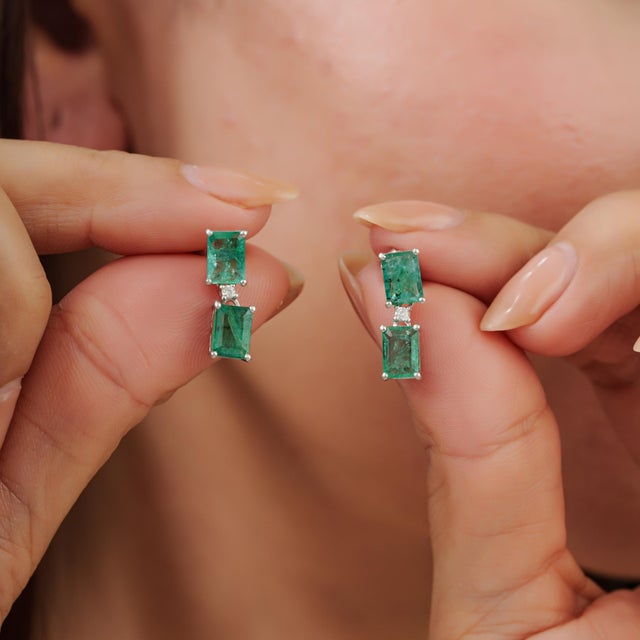 Art Deco-Inspired Certified Natural Emerald 2-Stone Drop Earrings with Diamond Accents in 925 Silver feature 3.91 Ct of...