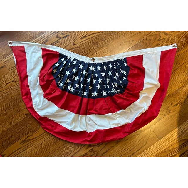 8 American flag buntings with 3 grommets for hanging. 36" width x 18" height. 100% washable cotton. Includes 24 plastic...