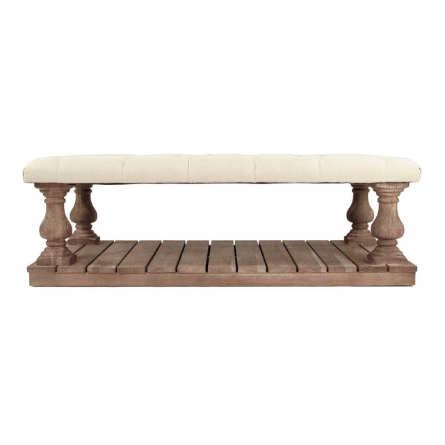 This ottoman / coffee table features a combination of oak wood and natural linen, offering both functionality and...