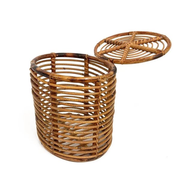 Beautiful Mid-Century oval bamboo and rattan container basket. This item is attributed was produced in Italy during 1950s....