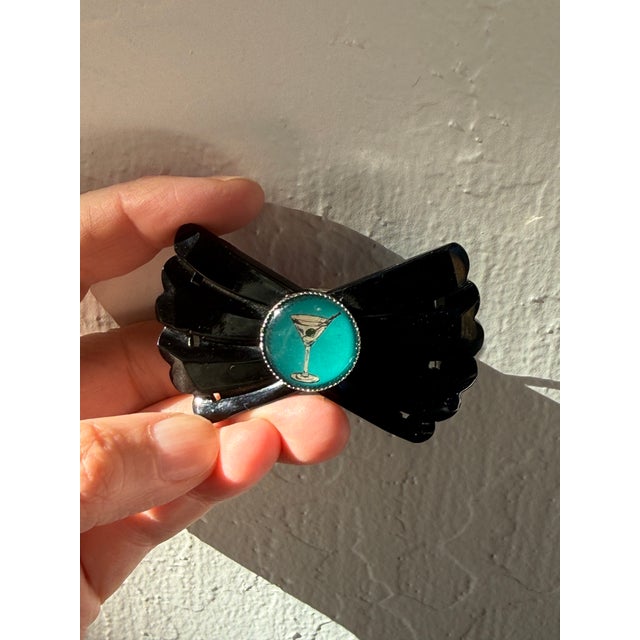 An exceptional, authentic 1930s Art Deco black Bakelite convertible piece. Expertly designed as a multi-functional...