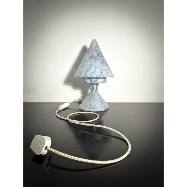 A striking 1920s Cubist-style glass table lamp, crafted using the pâte de verre or pâte de verre marmoreen technique in...
