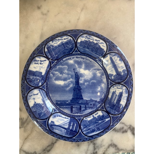 Celebrate the history and charm of New York City with this beautiful antique blue and white transferware souvenir plate by...