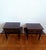 Pair of bedside tables in dark lacquered wood. The lower shelf is wider than the upper one. The front opens with a hinged...