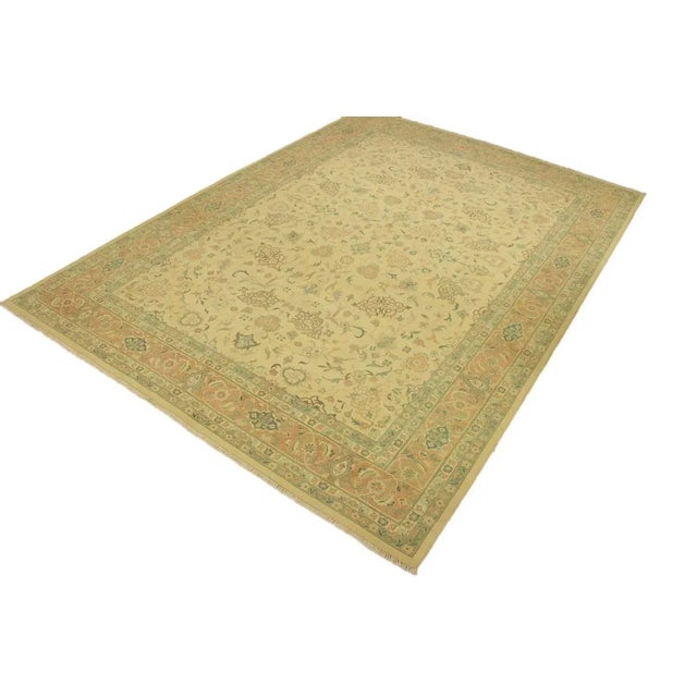 A Persian influenced Turkish hand knotted rug made by skilled artisans capable of creating the most exceptional vegetable...