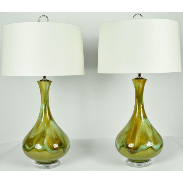 Beautiful pair of Royal Haegar drip glaze lamps. The sheen on these is beautiful. Lamps have been rewired with new 3-way...