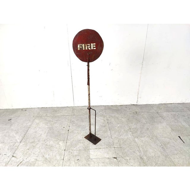Charming vintage enamel 'FIRE' sign mlounted on a wooden and metal base. Its unclear if this was used by the fire brigade...