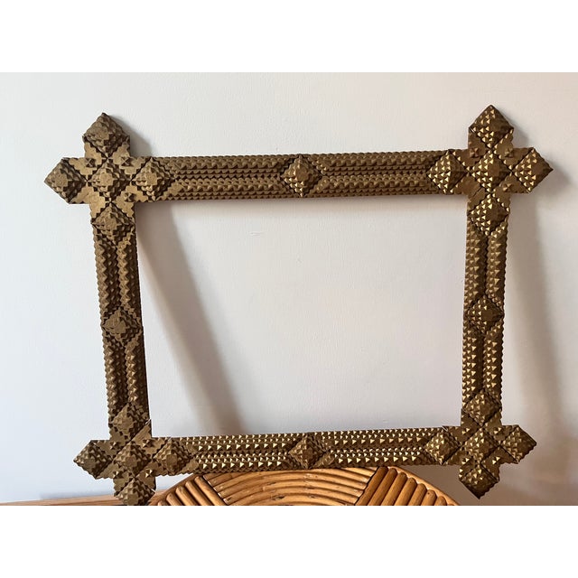A striking large-scale Tramp Art frame, hand carved in the late 19th or early 20th century in Central or Eastern Europe....