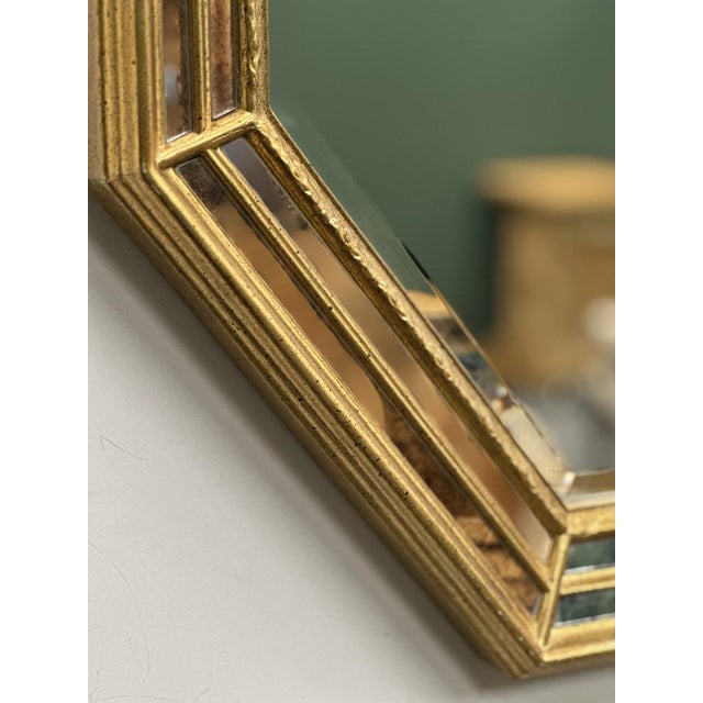 Width: 72 centimeters Height: 92 centimeters A beautifully matched pair of octagonal Deknudt mirrors from the 1970s,...