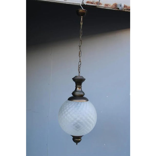 Italian Round Lantern in Murano Glass and Burnished Brass, 1950s, in Very Good conditions. Designed 1950 to 1959 Up to...