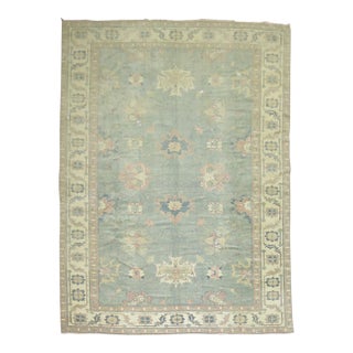 Vintage Feminine Worn Oushak Rug - 9' x 13'6" For Sale