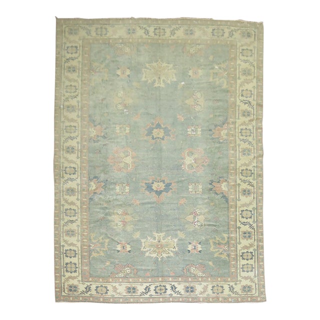 Vintage Feminine Worn Oushak Rug - 9' x 13'6" For Sale