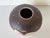 Beautiful 1992 Native American studio pottery vase featuring a distinctive rounded form with a wide mouth, hand-carved...