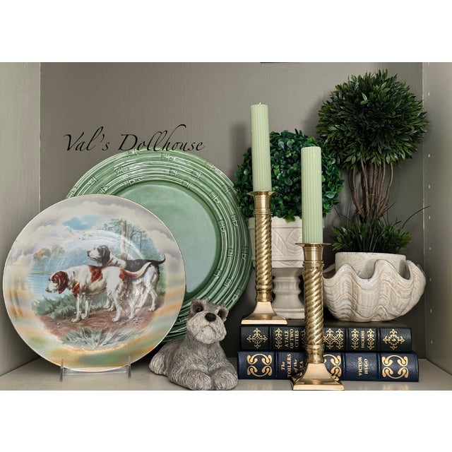 Presenting a pair of vintage high-quality solid brass candle holders in the Ralph Lauren aesthetic. Square bases support a...