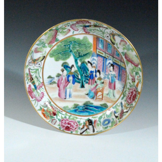 Chinese Export Porcelain Rose Mandarin Saucer Dish Canton, Circa 1810, Jiaqing Period This Chinese Export porcelain saucer...