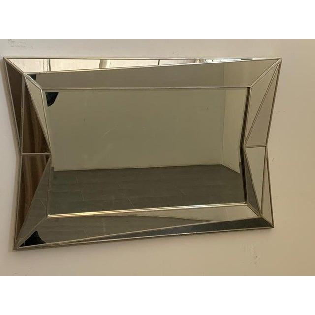 Unique and great quality for mirror in silvered wood, the style is cubist, the period 1970, it is assumed the French...