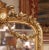19th Century French Louis XVI Giltwood Mirror With Shield Crest and Floral Decor For Sale - Image 4 of 8