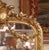 19th Century French Louis XVI Giltwood Mirror With Shield Crest and Floral Garland For Sale - Image 4 of 8