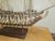 Large-scale brass sailing ship free standing sculpture, executed in a dramatic, dimensional composition and signed “C....