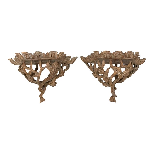 Cerused wood wall shelves. Carved branches and flowers. Flat Shelf area measures 9”x6”. From a prominent Hamptons Estate.