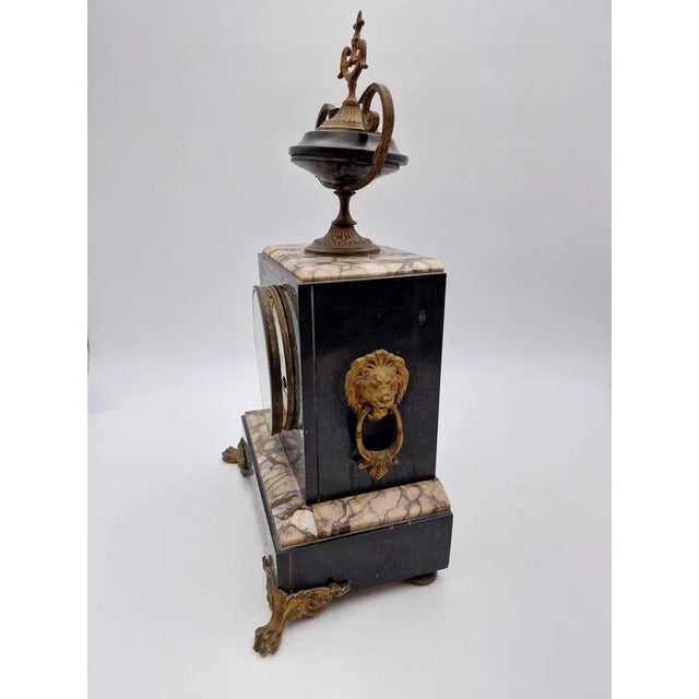 French marble watch, late 800 marble era with bronze inserts. Perfectly functioning clock, because it has been overhauled...