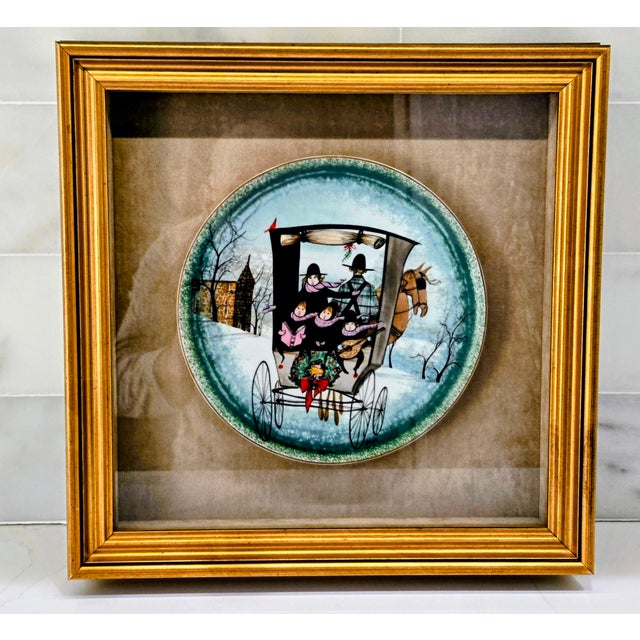 Capture the charm of a winter sleigh ride with this professionally framed Noel, Noel collectors plate by celebrated...