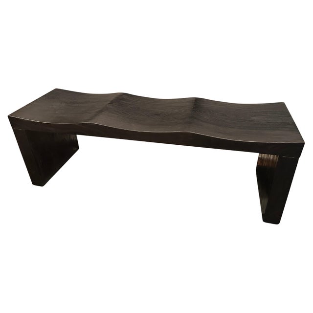 The wave bench represents a sleek, modern aesthetic, designed to provide comfort and durability. Solid reclaimed teak wood...
