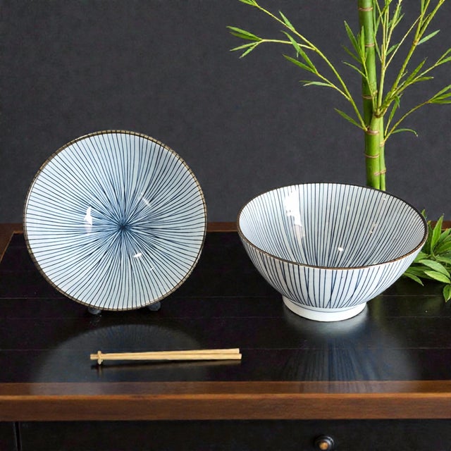 These Japanese blue and white sensuji lines serving bowls are a beautiful representation of Japanese culture and...