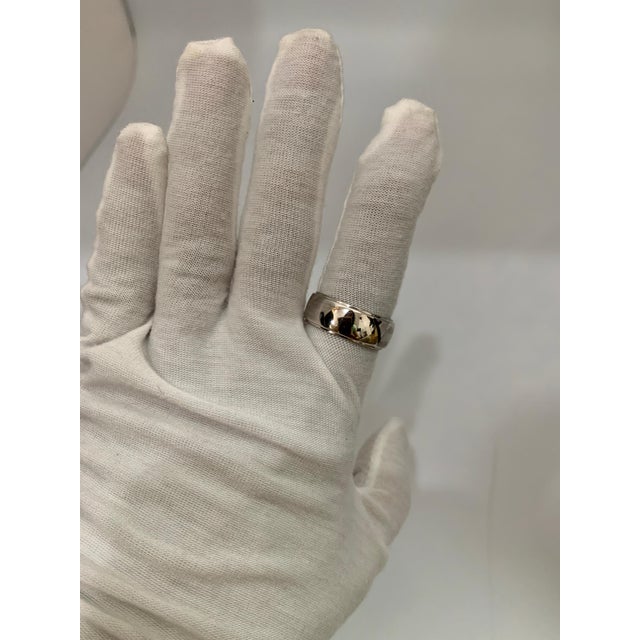 14 Karat White Gold Half Round Edge Wedding Band, 9 mm wide Estate, Size 11 This timeless style has the slight domed...