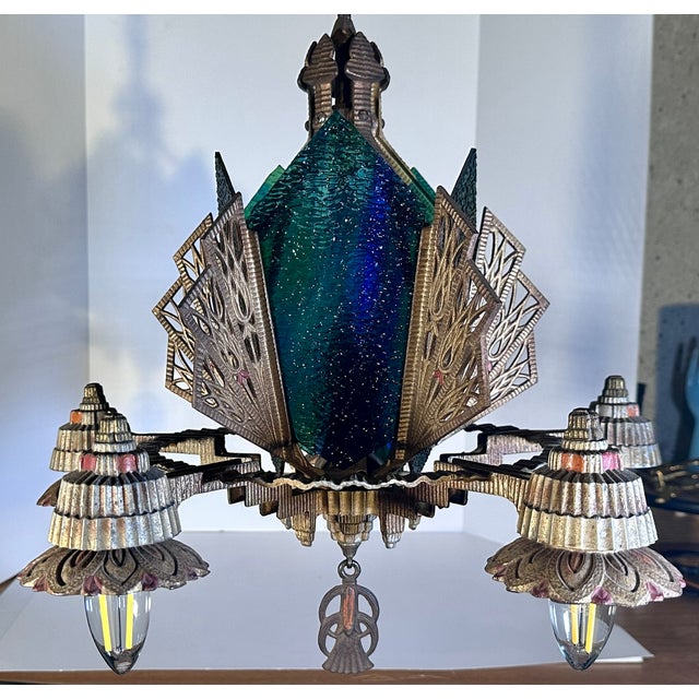 Rare & Original Art Deco Chandelier for your consideration. The chandelier measures approx. 19 inches tall and approx. 19...