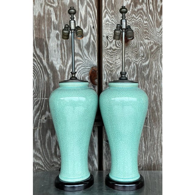 Illuminate your home with our Vintage Regency Crackle Glaze Lamps - A Pair. These elegant lamps feature a distinctive...