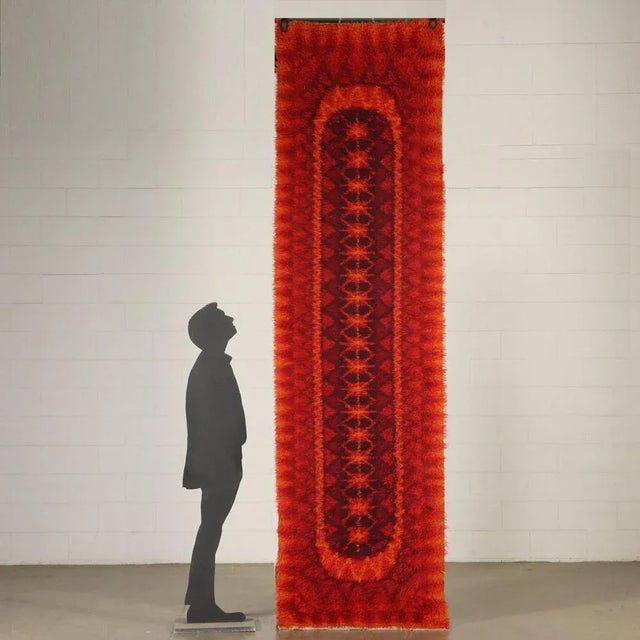 Vintage rug in wool blend with long pile. This piece is attributed to the mentioned designer/maker. It has no attribution...