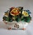This exquisite Capodimonte-style ceramic floral centerpiece showcases the artistry of mid-century Italian porcelain....