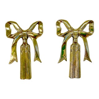 1970s Vintage Hollywood Regency French Brass Bow and Tassel Sculptural Wall Objects - A Pair For Sale