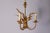 This 20th-century French chandelier embodies elegance inspired by Coco Chanel’s signature aesthetic, blending luxury with...