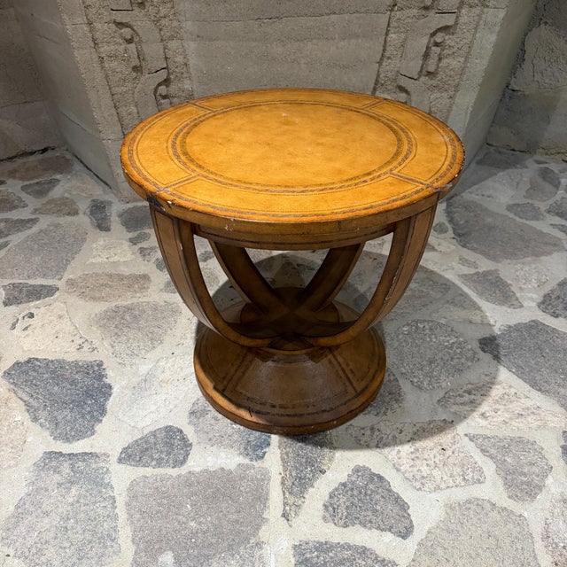 For your consideration, a Handsome Round Leather Embossed Side Table attributed to Maitland Smith (No label present). The...