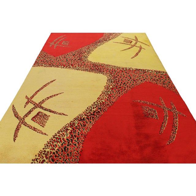 Hand-knotted in wool and originating from Turkey circa 1960 – 1970, this 7x10 vintage Zeki Müren rug is a unique addition...