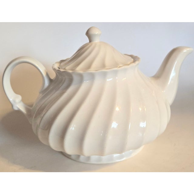 This is the "good" white ironstone. It has an ever so faint blue tint to the edges that comes with good quality vintage...