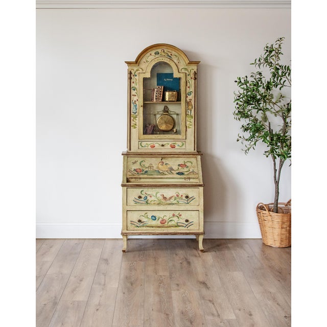 A beautifully hand-painted Italian secretary desk, rich with character and old-world charm, likely dating to 1920s and...