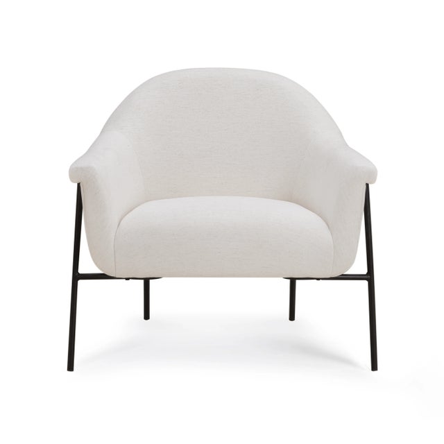 The Lua Chenille Accent Chair blends mid-century elegance with modern comfort. Its swooping shelter arms and high back...