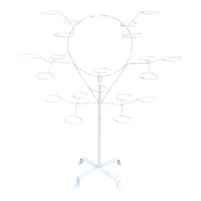 Mid-Century Rotating Wrought Iron 21 Ring Plant Stand For Sale