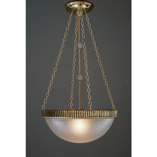 Otto Prutscher chandelier with original glass shade vienna around 1908. Brass polished and stove enameled. Original glass...