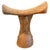 A beautiful hand carved African headrest with lovely patina. Circa 1950. We only select the best. Own an Andrianna...