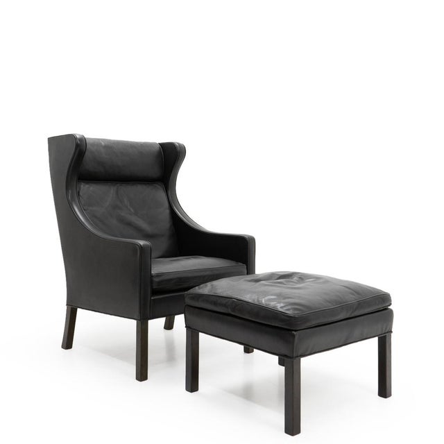 Set of Black Leather Wingchair and Ottoman by Borge Mogensen for Fredericia, 1960s, in Very Good conditions. Designed 1970...