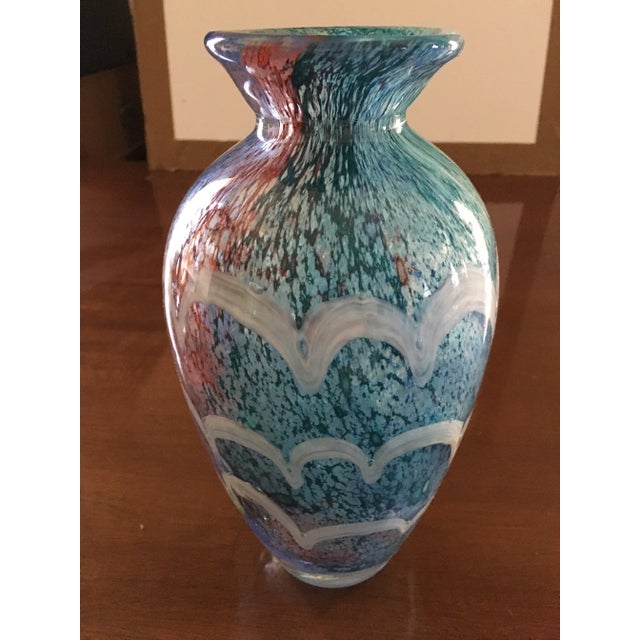 Aqua blue heavy glass vase with some accent colors. Mid Century style of the 50's-60's. Not sure of actual production...