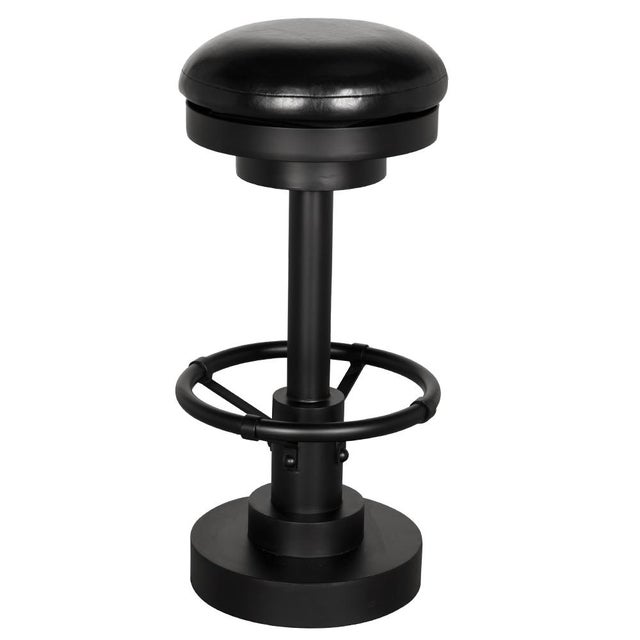 This industrial-style bar stool has a bold cylindrical shape, featuring a cushioned dome seat, a tubular metal column, and...