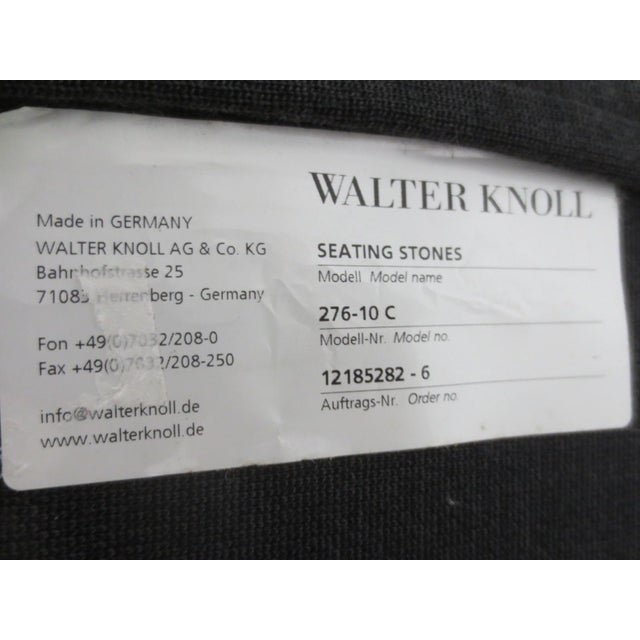 The Walter Knoll Seating Stones Armchair in blue, specifically the Seating Stone 272-10 C AR Knit, 8237 papaya Knit, and...